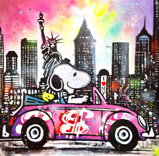 Snoopy visits New York in a VW Beetle